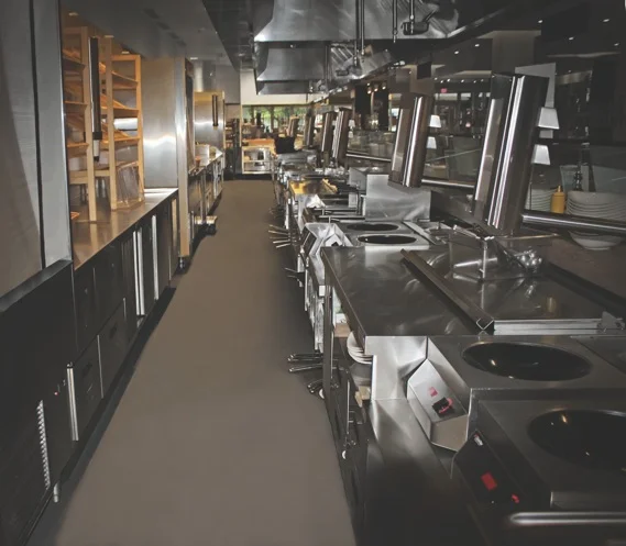 Wide view of Eco-Grip flooring installed throughout a commercial kitchen