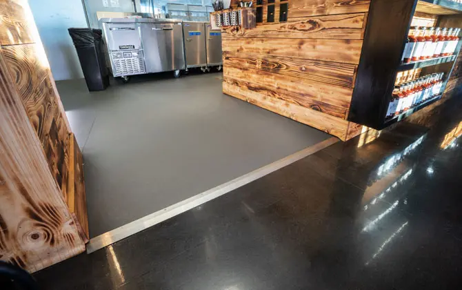 Eco-Grip flooring installed at the entryway to a commercial kitchen