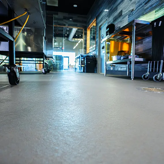 Slate color Eco-Grip flooring installed in a commercial kitchen