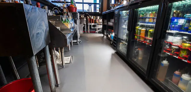 Eco-Grip Slate flooring installed across a commercial kitchen